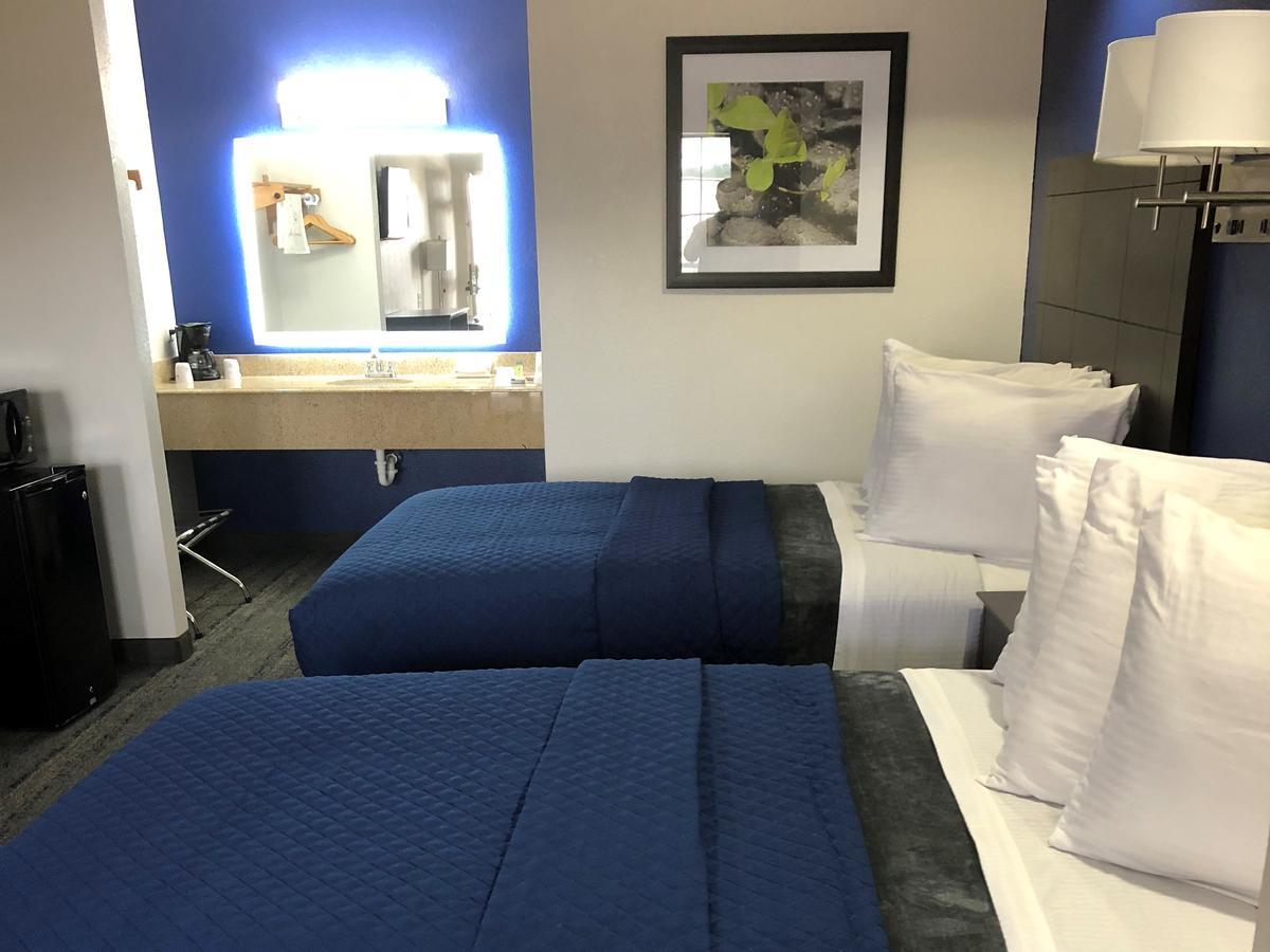 Executive Inn And Suites Joaquin Ngoại thất bức ảnh