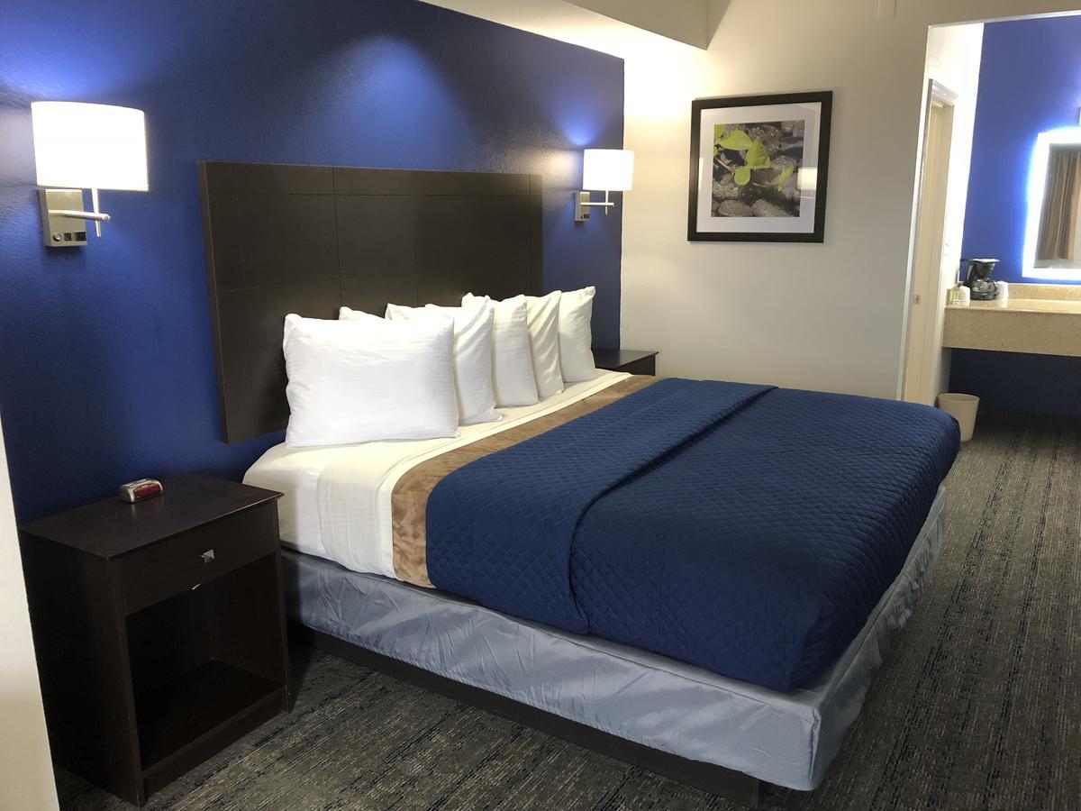 Executive Inn And Suites Joaquin Ngoại thất bức ảnh