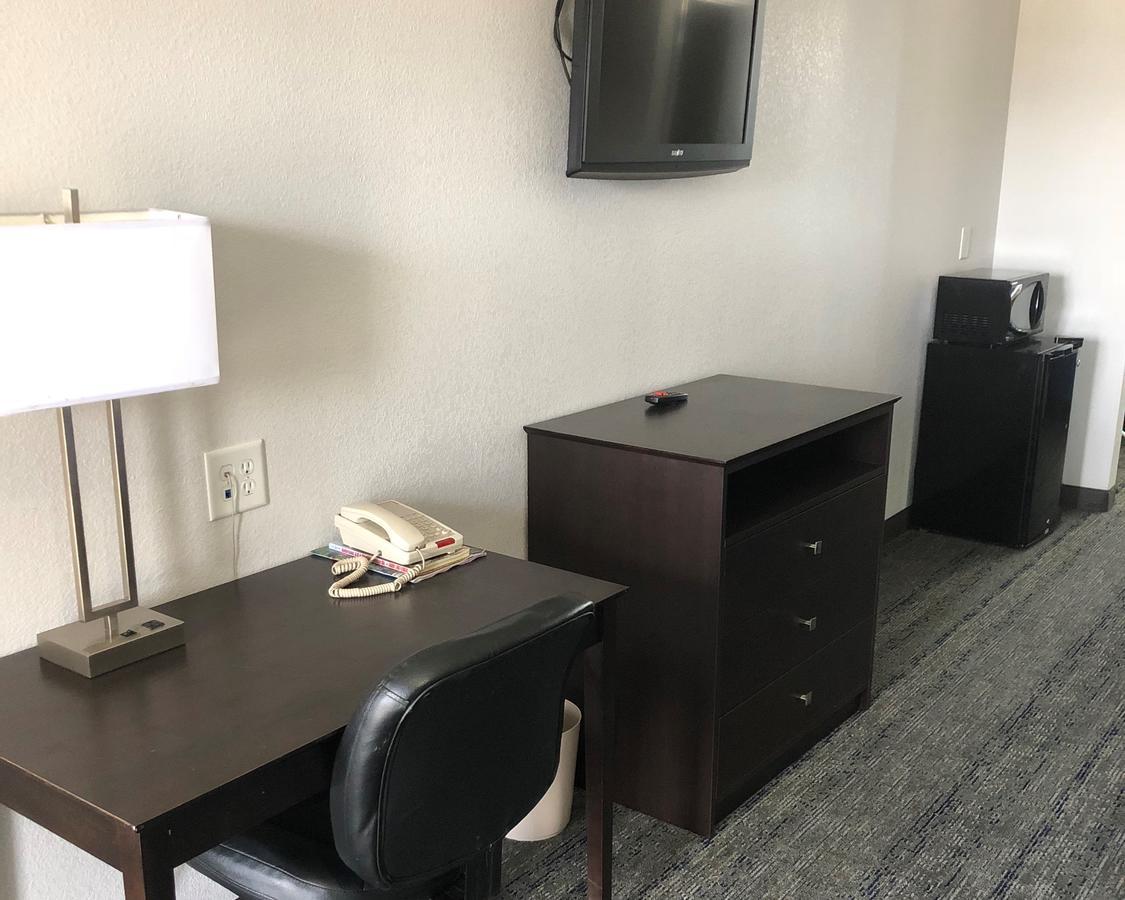 Executive Inn And Suites Joaquin Ngoại thất bức ảnh